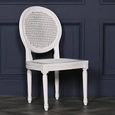 The production of natural wicker furniture dates back to early egypt where the egyptians produced. French Chateau White Rattan Dining Bedroom Chair Furniture La Maison Chic Luxury Interiors