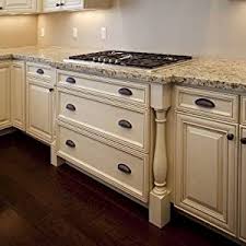 Gourmet kitchen features a pair of grosvenor single pendants hanging over a marble top island with turned legs topped with white marble fitted with a sink and vintage style faucet lined with backless gray leather counter stools with. Amazon Com Ekena Millwork Col03x03x35kerw 3 3 4 Inch W X 3 3 4 Inch D X 35 1 2 Inch H Kent Raised Panel Cabinet Column Rubberwood Home Improvement