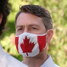 William amos, a liberal mp, was caught covering his nether regions with a mobile phone and in a state of nature between the flags of quebec and canada when his laptop camera turned on during the. William Amos Willaamos Twitter