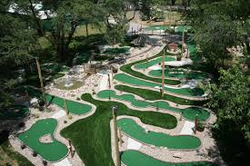 Once you're finished putting on the carpet, nail pressure treated 2 x 6s around the. Mini Golf Course Ideas Strange Miniature Golf Courses And Putt Putt Holes Mini Golf Course Mini Golf Miniature Golf