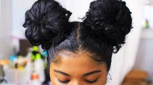 A bun is a type of hairstyle in which the hair is pulled back from the face, twisted or plaited, and wrapped in a circular coil around itself, typically on top or back of the head or just above the neck. Easy 2 Buns Curly Hairstyle Tutorial Baby Hairs Youtube