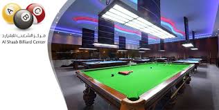 A man who loves snooker. Al Shaab Billiards Center Indoor Activities Cobone Offers