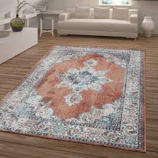 Made in turkey from polyester, this rug features a classic center medallion and a border in hues of terracotta, denim, sky blue, and sage. Bungalow Rose Codey Jay Oriental Terracotta Ivory Area Rug Reviews Wayfair