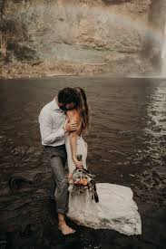 This Bride Wasn T Afraid To Get Her Wedding Dress Wet During This Epic Kauai Elopement Popular Wedding Dresses Wedding Event Dresses Bridal Hair Inspiration