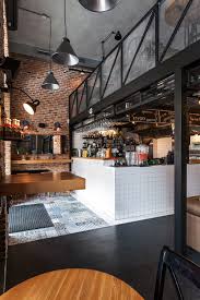 11 Examples Of Industrial Home Design To Keep You Inspired Industrial Cafe Industrial Restaurant Cafe Decor