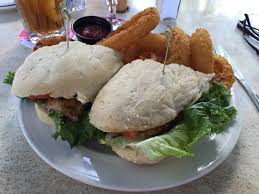 Blackened Walleye Fish Sandwich With Onion Rings Picture