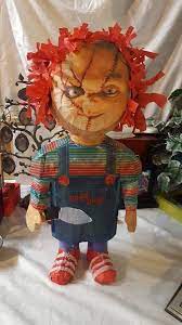 Horror Movie Themed Pinatas For The Whole Family To Enjoy Geektyrant Kids Playing Chucky Spooky Treats