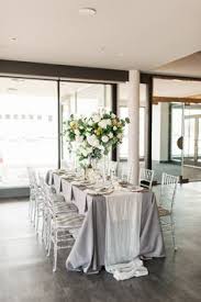 Beautiful Floral Centerpieces Tall Centerpieces Ghost Chiavari Chairs Table Runner Midwest Iowa Weddi Top Wedding Planners Tall Centerpieces West Wedding