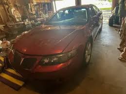 Image result for Red Brown 2004 Pontiac