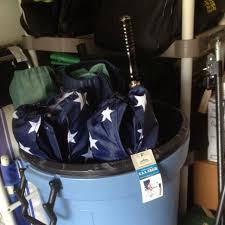 Genius Idea Put Camp Chairs And Umbrellas In Old Trash Can Assagetables Chairsandsupplies Camping Chairs Chair Storage Camp Chair Storage