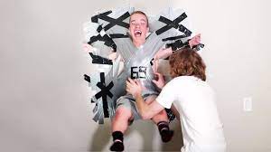 Taped To The Wall Prank! - YouTube