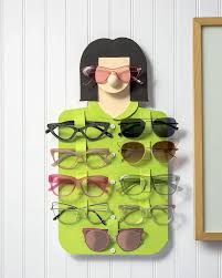 Slide your shades on and off with ease. Diy Glasses Holder Display With Fun Faces Mod Podge Rocks