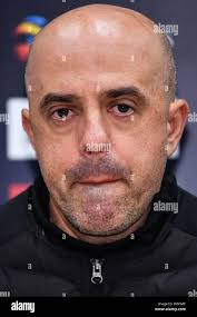 Head coach Andre Luiz Alves Santos, shortly Andre, left, and Brazilian  football player Edgar Bruno da Silva of South Korea's Daegu FC attend a  press c Stock Photo