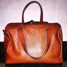 Love all essentials in it, everything is so organized! One Year With My Dream Handbag Fossil Sydney Satchel