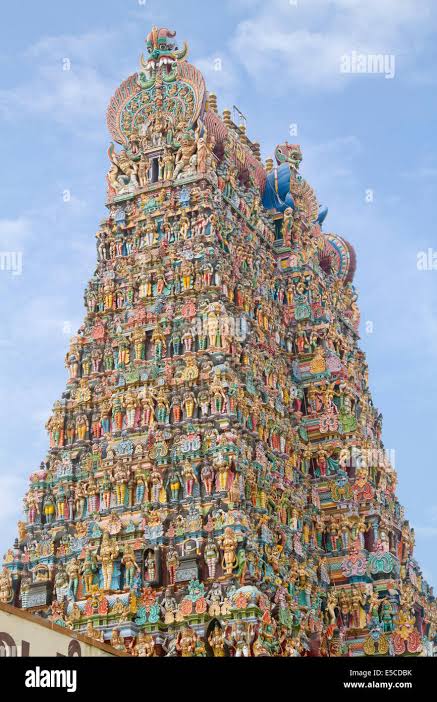 Gopura (pyramid shaped gate) in the Minakshi Sundareshvara Temple covered with stucco images of gods;goddesses and guardian mons Stock Photo - Alamy