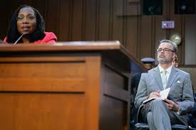 Beside the nation's first Black woman Supreme Court justice is her husband,  a 'quintessential Boston Brahmin'