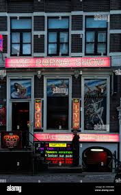 bouncer outside live porno sex show stage sexshop pornography legal tourism  amsterdam peep show Stock Photo - Alamy