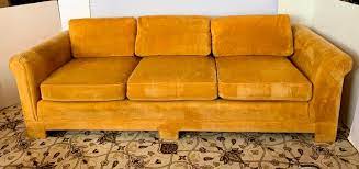 At 12 feet long across the arms this is a statement piece of gran… Pair Of Matching Mid Century Modern Century Furniture Hermes Orange Velvet Sofas At 1stdibs