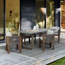 Wood outdoor dining sets from patioliving are sets that are manufactured from natural wood materials and intended for use in an exterior dining setting. Concrete Outdoor Dining Table Porto Chairs Set