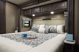 As one of the most common types of homes or apartments available, two similar to an l shape, but not quite, this apartment feels open and spacious with a layout that wraps each bedroom around a large shared living area. The Best 2 Bedroom Rvs Out There Mortons On The Move