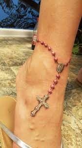 Celtic cross rosary tattoo on foot. Rosary Tattoos Ideas Meaning Rosary Beads Tattoo Designs Tattoo Me Now