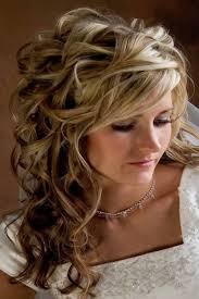 The tuft of the hair is bunned to the side and adorned with jasmine flowers and elaborate jewellery andal's parrot. Country Western Wedding Dresses Wedding Hairstyles For In 2020 Wedding Hairstyles For Long Hair Prom Hairstyles For Long Hair Bridesmaid Hair