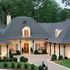 Ranch house plans usually rest on slab foundations, which help link house and lot. 1