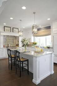 Think white cabinets above the sink paired with shades of blue, black, or brown below. 54 Stunning White Kitchen Cabinets With Dark Brown Island Toparchitecture White Granite Countertops Kitchen Remodel Kitchen Flooring