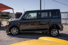 Image result for Black Mica 2006 Scion