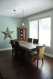 As You Move Indoors For The Season It S A Good Time To Turn Your Attention To The Rustic Chandelier Dining Room Dining Room Lighting Dining Room Contemporary
