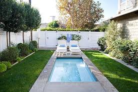 The size of this pool is 22'6 x 8', while the baja shelf is 9' x 8'. A Tiny Pool In The Small Urban Backyard Is All You Need To Beat The Summer Heat Decoist Small Backyard Landscaping Small Pool Design Small Backyard Pools