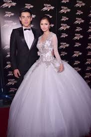 Kim Chiu And Xian Lim At The Star Magic Ball Sheer Wedding Dress Wedding Dresses Beaded Wedding Dresses Lace Ballgown