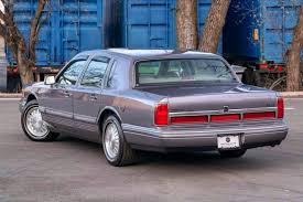 Image result for Portofino Blue 1995 Town Car