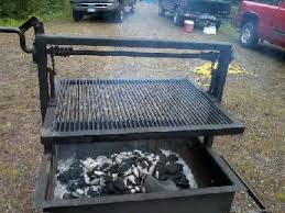 Another great way to cook nearly anything on a fire pit is with a simple metal grate placed over the fire. Cowboy Campfire Grill Plans Fire Pit Cooking Campfire Grill Fire Pit Backyard