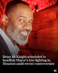 Keira Knox, wife of Houston Tactical Flight Officer Jason Knox, and her  son, Cooper, holding his dad's flight helmet and his parents, retired  officer and Houston City Councilman, Mike Knox and his