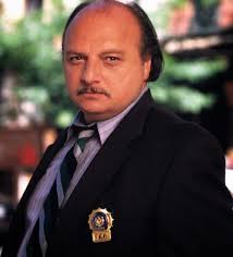 Pictured here is Dennis Franz of NYPD Blue visiting the Saratoga Springs  Police Station sometime around 2002. Also in the photo is Paul Veitch,  Scott Johnson, Mike Rayburn, Aaron Benware, Mike Welch,