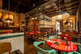 peppes pizza restaurant by riss interiorarkitekter oslo norway 03 peppes pizza restaurant by riss in bar restaurant interior restaurant decor cafe bar interior