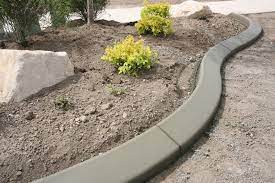 You can color poured concrete during mixing to match or contrast the paving material. Garden Edging Kerbing