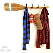 Upcycling A Boat Oar As A Nautical Coat Rack And Rustic Cabin Decor Diy Clothes Rack Cabin Decor Canoe Paddle