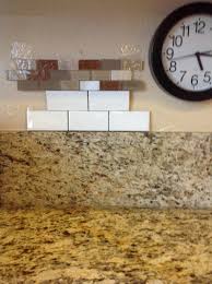 I would try the heat gun first. Remove 6 Granite Backsplash Before Adding Tile