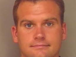 Commissioner's Son Charged in Slaying