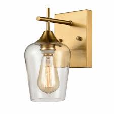 The modern, staggered brass chandelier in this example by interior designer lindye galloway is the perfect edgy touch for an elegant bathroom. Brass Modern Bathroom Vanity Wall Sconce Claxy