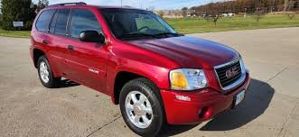 Image result for Red 2003 Envoy