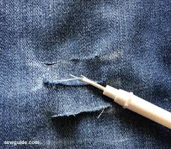 A little ripped jeans diy tutorial. Make Your Own Knee Ripped Jeans Without Removing The White Thread Sew Guide