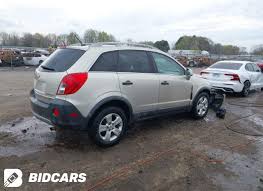 Image result for Silver Topaz 2013 Captiva