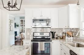 Take black kitchen cabinets for example. Lowe S Stock Cabinets Review Diamond Now Arcadia White Shaker Cabinets Elizabeth Burns Design Raleigh Nc Interior Designer