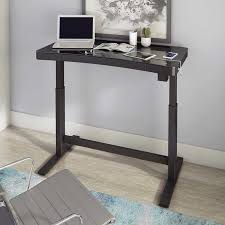 This adjustable standing desk offers a large desktop surface of 55.1 x 23.6, as well as a steel frame with a crossbar for additional support. Tresanti 47 Adjustable Height Desk