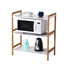 Depending on the model you choose you may find that you need the shelf the microwave sits on to protrude out a little further than your upper cabinets, and you'll want to plan ahead so that your electrician puts the required outlet on the wall in the space. Microwave Oven Shelf 3 Tier Wooden Display Decoration Shelf Cabinet Rack Holder Furniture For Utility Room Free Standing Easy Design White Buy Online In Cayman Islands At Desertcart 74518404
