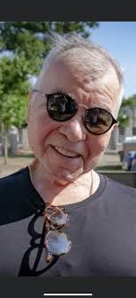 Can you picture her next Thursday? Can you picture her at all? In the Hotel  Boulerado at the dark end of the hall