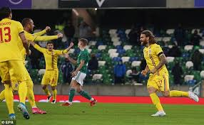 This is his rare silver card. Northern Ireland 1 1 Romania Late Goal Cancels Out Liam Boyce S Opener Daily Mail Online